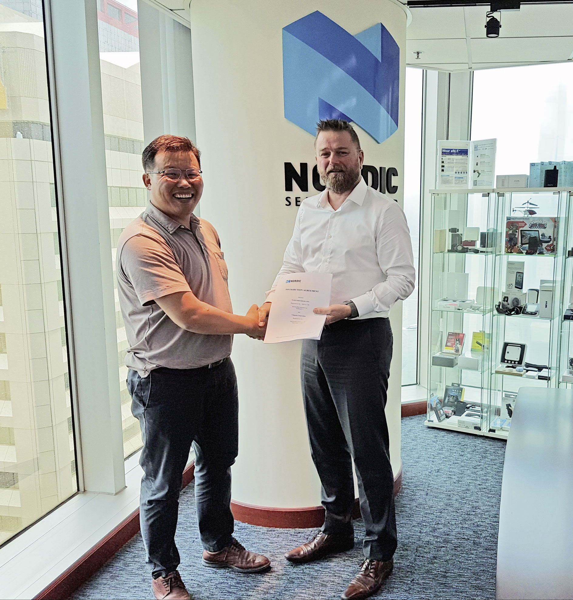 a man and a woman standing in front of a building