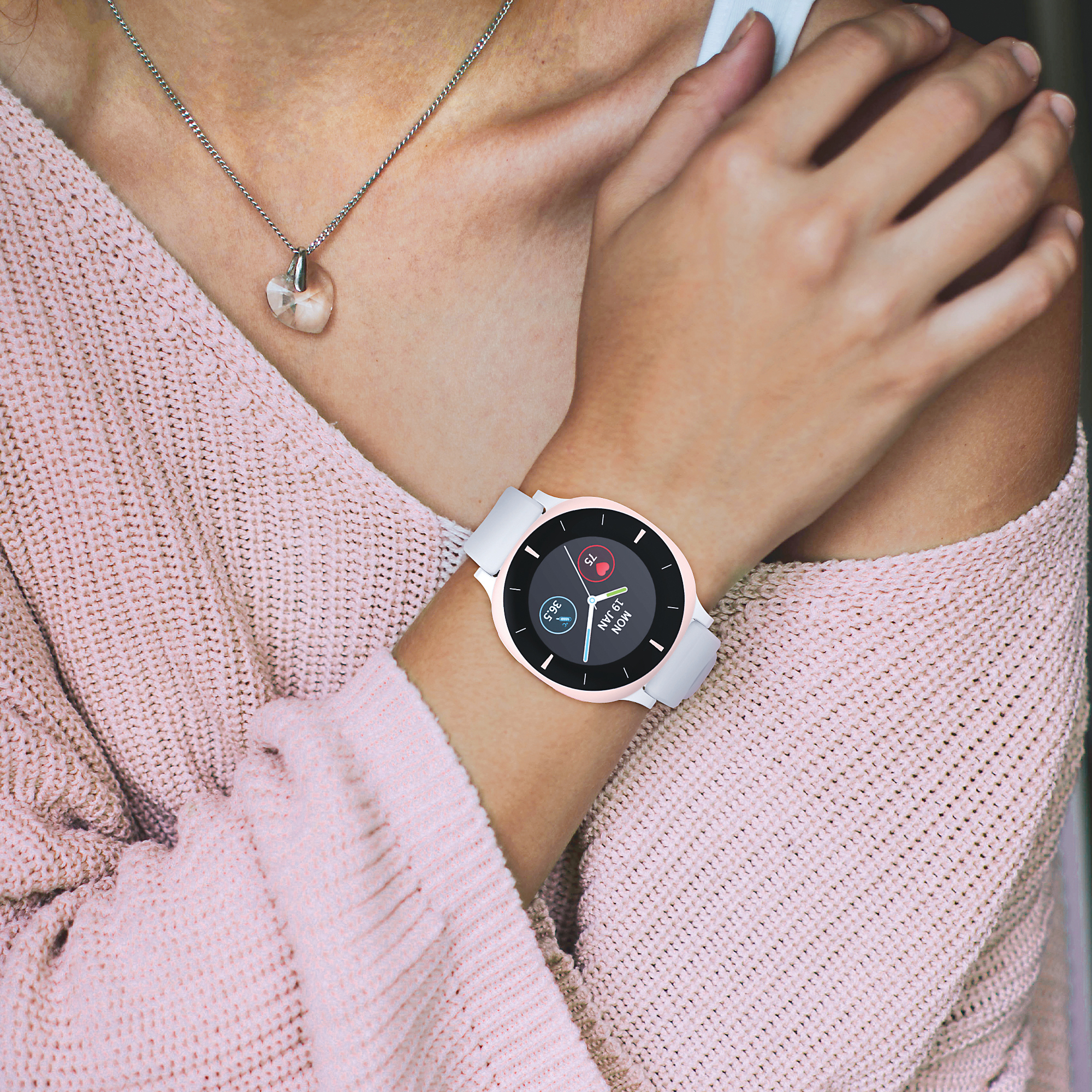 Women with white watch on her arm from August International 