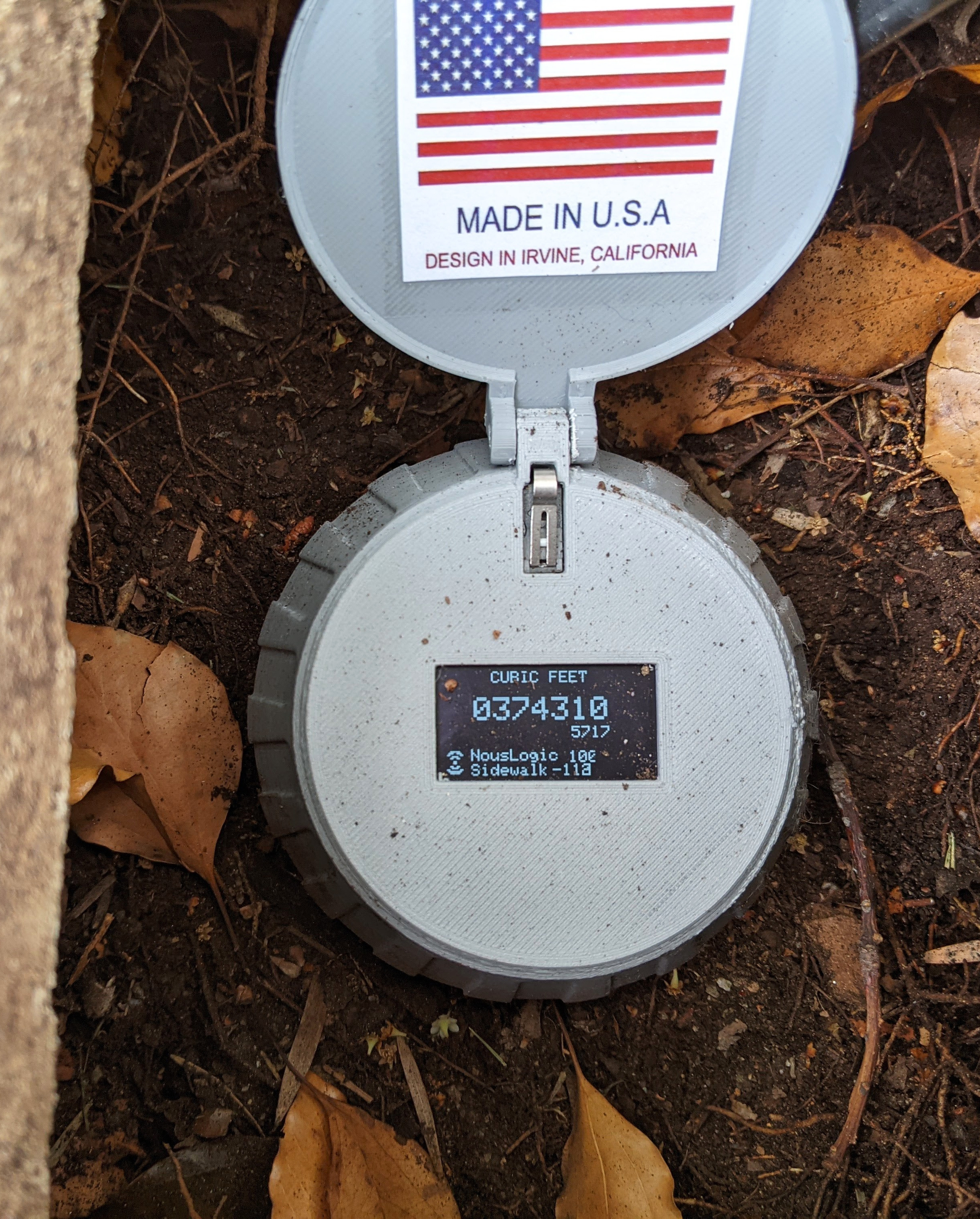 a sign on the side of a dirt field