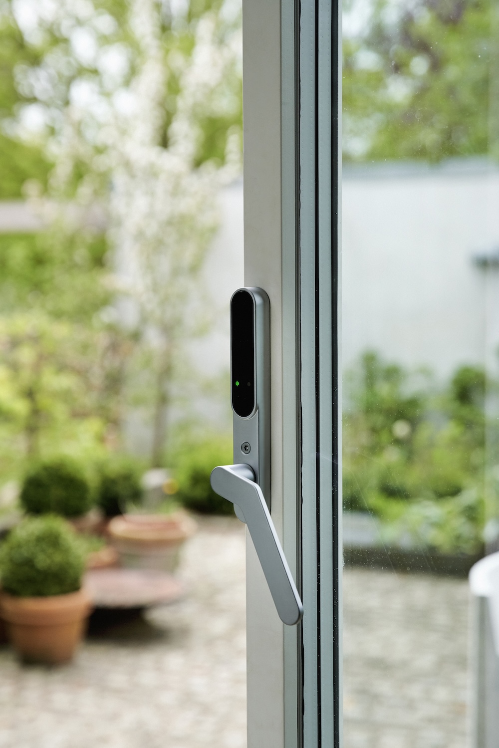 building sitting window parking meter fence glass door table street kitchen standing