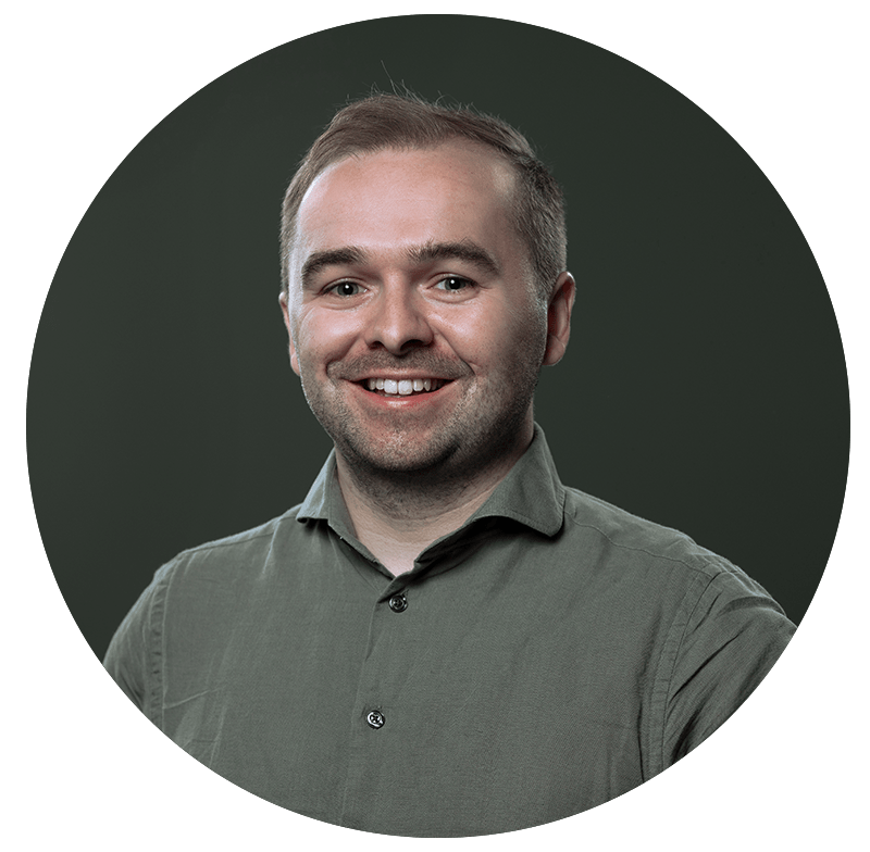Portrait of man smiling with green pique shirt